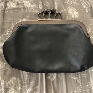 Brass knuckles purse clutch